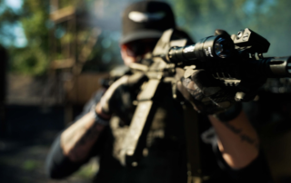 A security guard aiming at a criminal with a sniper