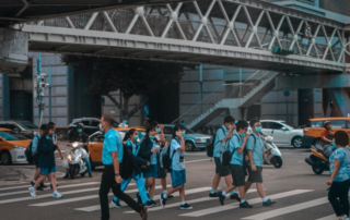 Children crossing the road en route to school