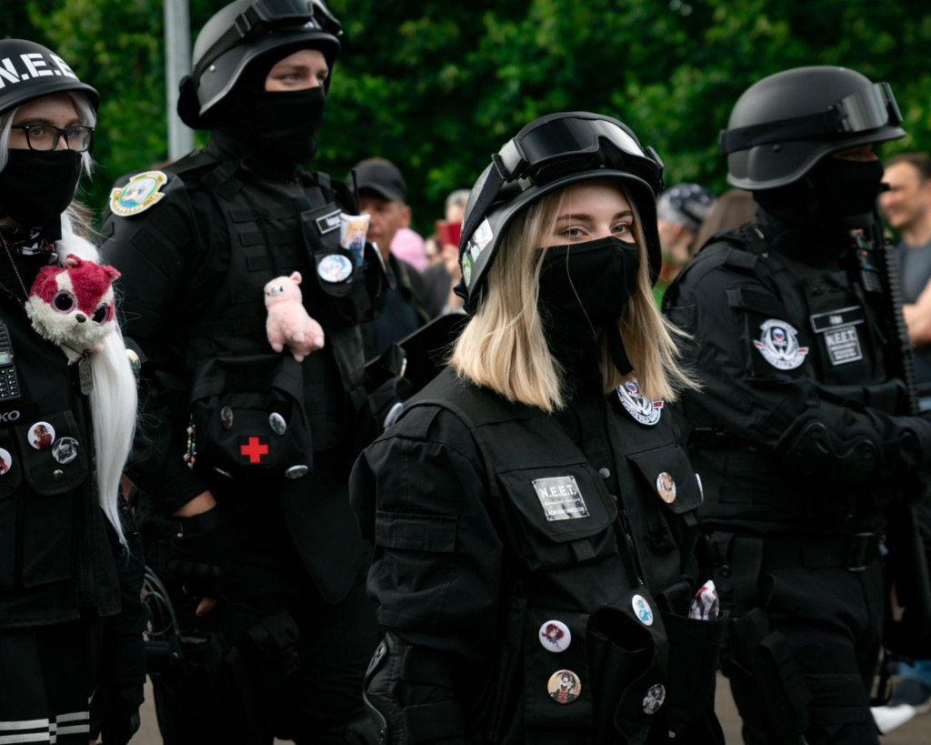 Trained armed security officers standing in lines