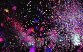 People throwing confetti during a community event in the US