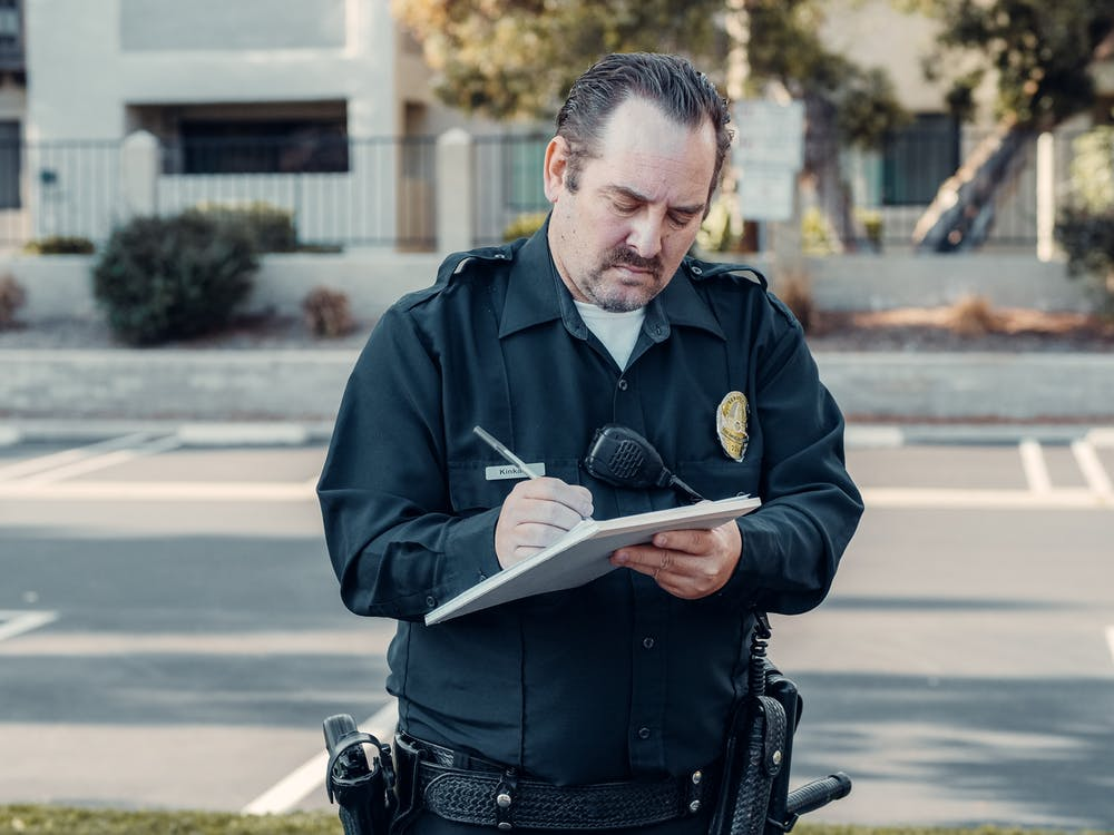 Police officer filling form