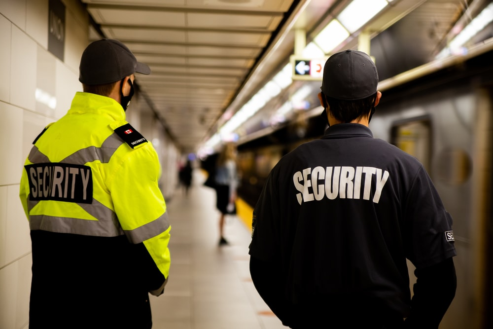 Armed security officials in the subway