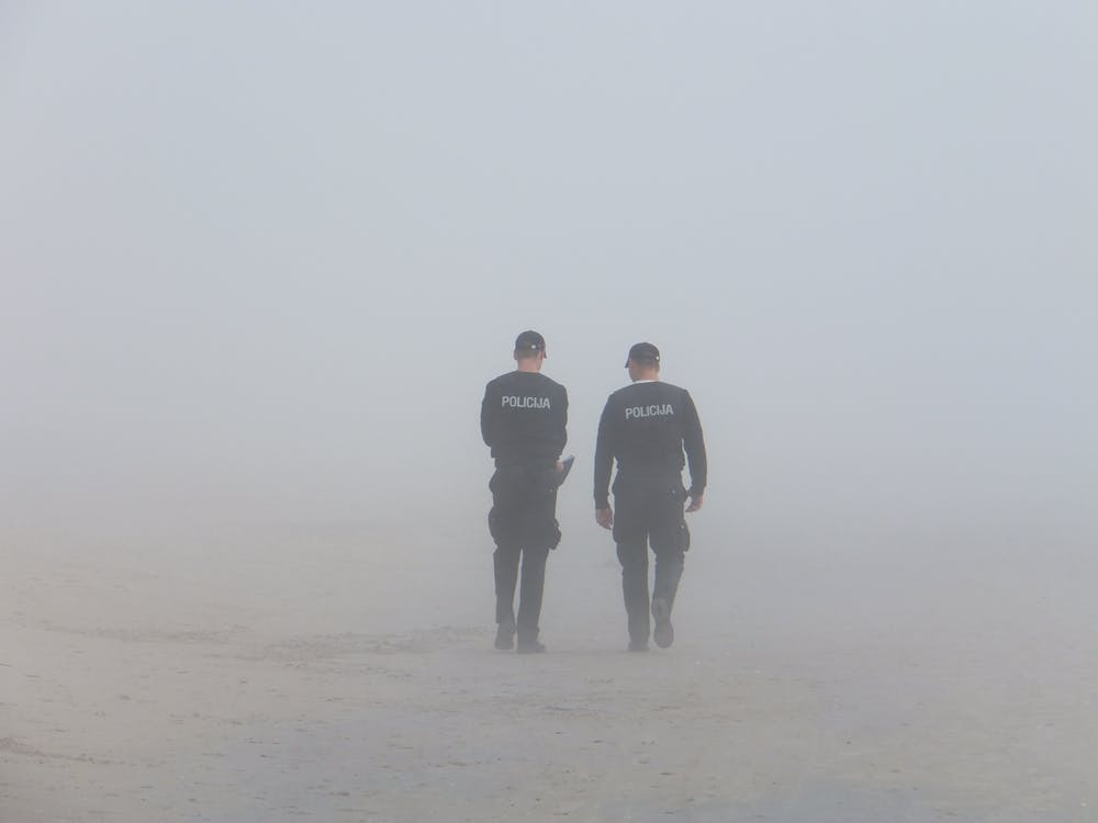 Security officers walking in a dangerous area