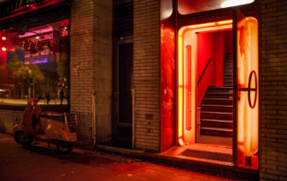 An image of a scooter near an open door