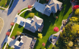 An image of an aerial view of a home in a gated community