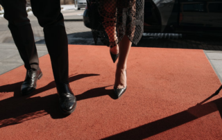 People walking on a red carpet