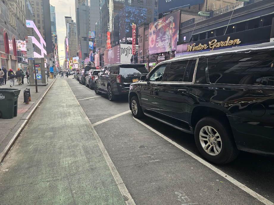This photo shows multiple security cars in line.