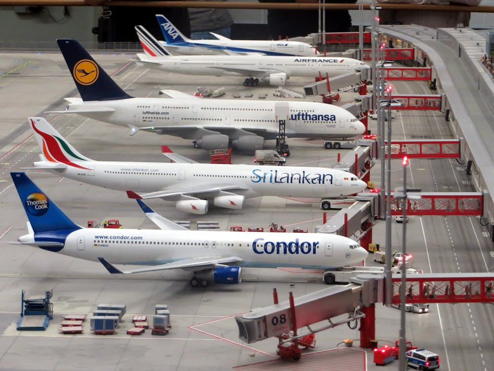 Airplanes lined at an airport